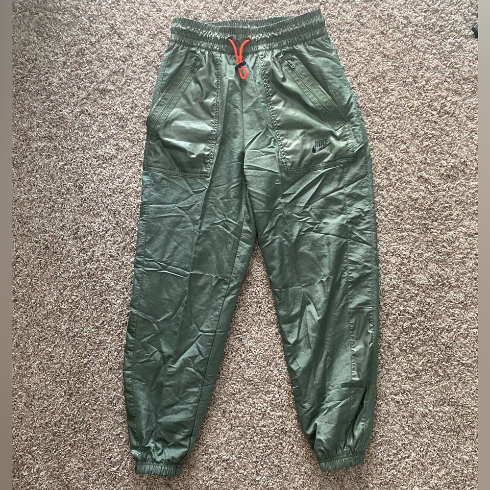 Olive Nike track capri pants